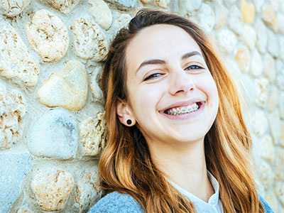 girl smiling in braces