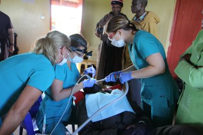 Honey Orthodontics Kenya Mission - Oasis for Orphans - Performing Dental Work